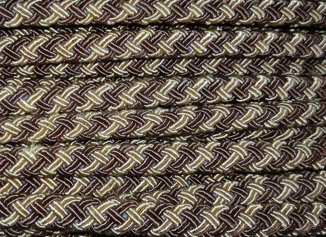 Szövött-fonatolt dekorációs óarany-barna zsinór ¤ 8 mm. 200 Ft/méter